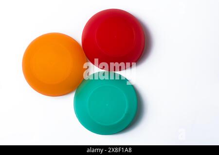 Colorful plastic cups isolated on white background. Top view. Stock Photo