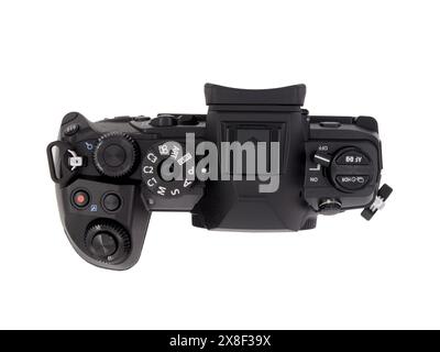 BUCHAREST, ROMANIA - AUGUST 21, 2020. Olympus OM-D E-M1 Mark II mirrorless micro four thirds digital camera, black body, isolated on white, upper view Stock Photo