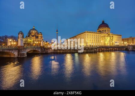 The Berlin Cathedral, the TV Tower and the rebuilt City Palace at night Stock Photo