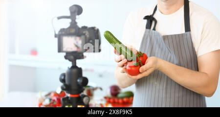 Comic Culinary Blogger Holding Organic Vegetables Stock Photo