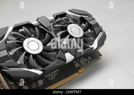 Computer graphics card on gray background, closeup Stock Photo