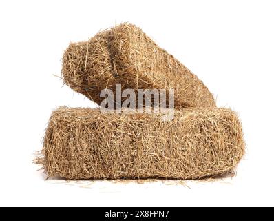 Bales of dried straw isolated on white Stock Photo