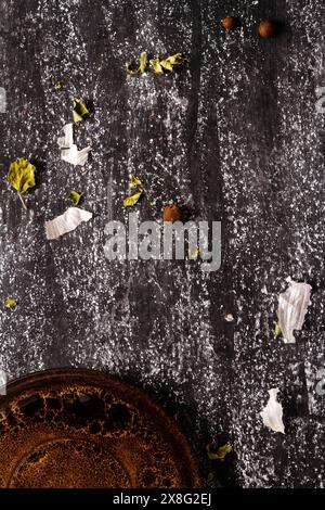 Brown plate on blackboard texture. Food backdrop. Stock Photo