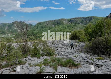 Climbing limestone fissures to Subra peak, Orjen Mountains,  Herceg Novi, Montenegro Stock Photo