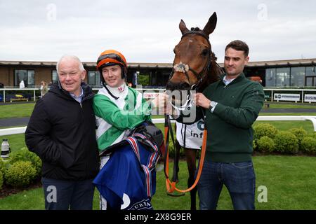 Jockey Colin Keane and Trainer Gerard Keane (left) after winning the Infinite Energy Handicap (Premier Handicap) on Tattersalls Irish 2000 Guineas Day at Curragh Racecourse, County Kildare. Picture date: Saturday May 25, 2024. Stock Photo