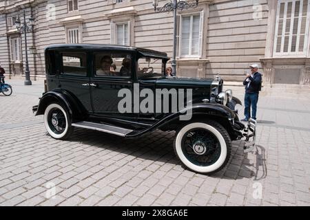 Classic and antique car meetings in Madrid held in the Plaza de Oriente of the Royal Palace of Madrid, May 25, 2024, Spain Stock Photo