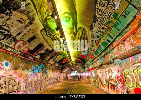 London Leake Street The Graffiti Tunnel vivid images in the colourful dark tunnel Stock Photo