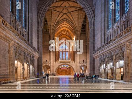 Interior view of the central space and nave and large stained glass windows of Liverpool Cathedral off Hope Street, Liverpool, Merseyside, UK on 22 Ma Stock Photo