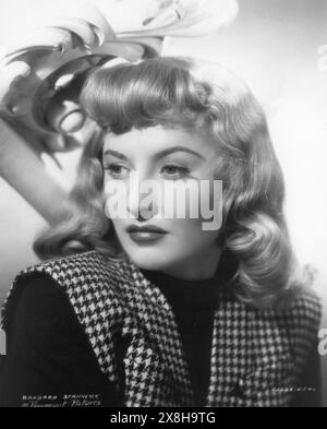 BARBARA STANWYCK Publicity Portrait for DOUBLE INDEMNITY 1944 Director BILLY WILDER  Novel JAMES M. CAIN Screenplay RAYMOND CHANDLER  Costume Design EDITH HEAD Paramount Pictures Stock Photo