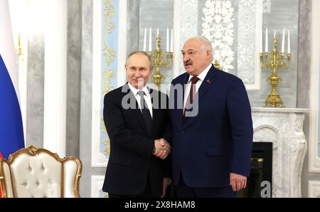 On an official visit to Belarus, Russian President Vladimir Putin meets with President of Belarus Alexander Lukashenko. Stock Photo