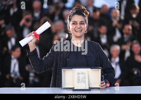 Cannes, France. 25th May, 2024. Payal Kapadia poses with the 'Grand Prix' Award for 'All We Imagine As Light' during the Winners Photocall as part of the 77th Cannes International Film Festival in Cannes, France on May 25, 2024. Photo by Aurore Marechal/ABACAPRESS.COM Credit: Abaca Press/Alamy Live News Stock Photo