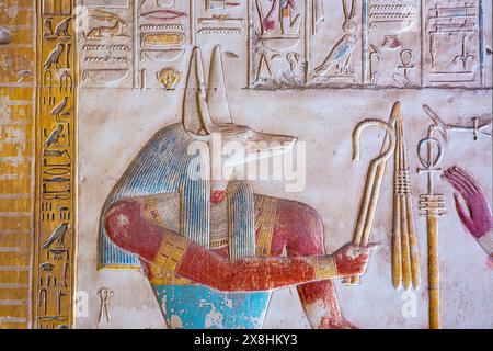 A relief inside the Temple of Seti I in Abydos, Egypt, showing Anubis, the god of the afterlife Stock Photo