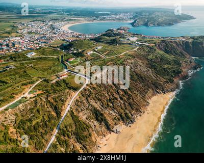 Aerial drone view of Praia da Gralha looking towards Sao Martinho do Porto, Portugal Stock Photo