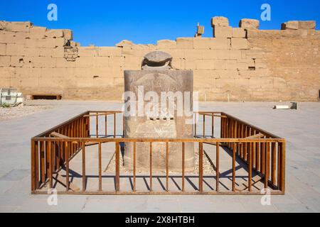 Granite statue of a scarab beetle (representing the scarab-faced god Khepri) at the Karnak Temple complex in Luxor, Egypt Stock Photo