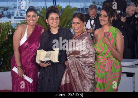 Cannes, France. 25th May, 2024. CANNES, FRANCE - MAY 25: Divya Prabha, Payal Kapadia, Chhaya Kadam and Kani Kusruti pose the Grand Prix Award for 'All We Imagine As Light' at the Palme D'Or Winners Photocall at the 77th annual Cannes Film Festival at Palais des Festivals on May 25, 2024 in Cannes, France. Credit: dpa/Alamy Live News Stock Photo