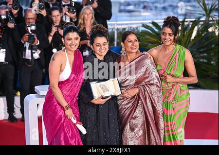 Kani Kusruti, Chhaya Kadam, Payal Kapadia and Divya Prabha pose with the Grand Prix Award for 'All We Imagine As Light' at the Palme D'Or Winners Phot Stock Photo