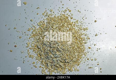Food, cropped close-up of oat flakes against white background Stock Photo