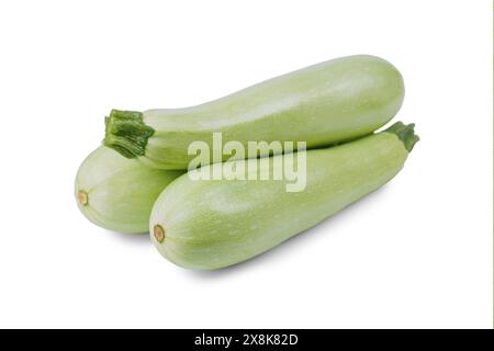 Fresh ripe green organic zucchini or courgettes isolated on white background. Heap of raw vegetable marrow, healthy food, ingredient, agriculture. Stock Photo