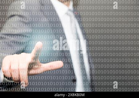 A businessman touching a digital of binary code Stock Photo