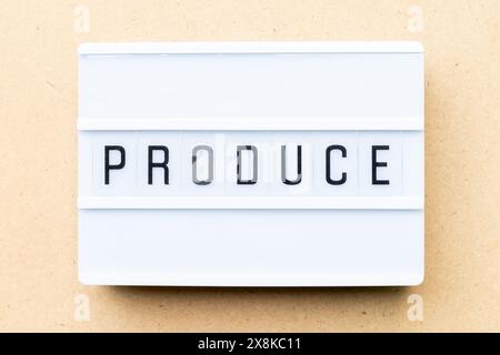 White lightbox with word produce on wood background Stock Photo
