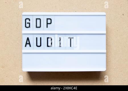 Lightbox with word GDP (Good distribution practice) audit on wood background Stock Photo
