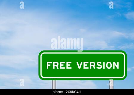 Green color transportation sign with word free version on blue sky with white cloud background Stock Photo