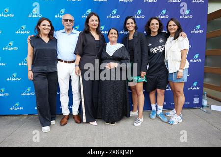 Berlin, Germany. 26th May, 2024. Tuna (l-r), Seyhmus, Düzen, Fatma, Tülin, Tugba and Tezcan Tekkal attend the 'Scoring Girls' charity kick-about organized by HÁWAR.help at the Poststadion in Lehrter Straße and promptly injure themselves while warming up. Credit: Joerg Carstensen/dpa/Alamy Live News Stock Photo