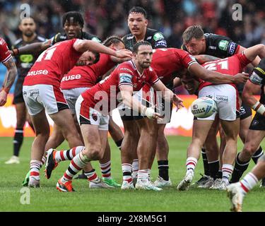 Eccles, UK. 26th May, 2024. Joe Mellor of Salford Red Devils offloads during the Betfred Super League Round 12 match Salford Red Devils vs Wigan Warriors at Salford Community Stadium, Eccles, United Kingdom, 26th May 2024 (Photo by Mark Cosgrove/News Images) in Eccles, United Kingdom on 5/26/2024. (Photo by Mark Cosgrove/News Images/Sipa USA) Credit: Sipa USA/Alamy Live News Stock Photo