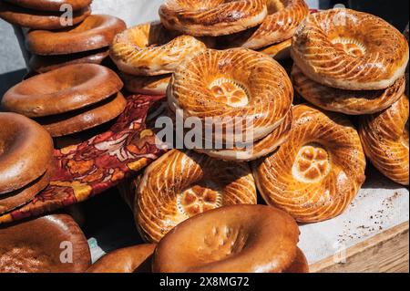 traditional Asian flatbread Kazakh tandoor bread on the counter at the bazaar in Kazakhstan Stock Photo