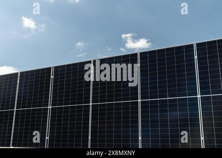 Solar panels on a background of blue sky. Stock Photo