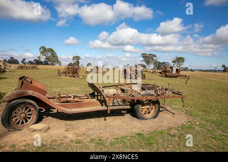 Rusting rusted agricultural farm equipment on farmers land near Dangars Gorge Armidale in New South Wales,Australia Stock Photo