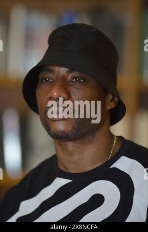 Coral Gables, Florida, USA. 25th May, 2024. Charlamagne Tha God, co-host of iHeartRadio's The Breakfast Club attends his latest book signing of 'Get Honest or Die Lying: Why Small Talk Sucks' at Books and Books-Gables on May 25, 2024 in Coral Gables, Florida. Credit: Mpi10/Media Punch/Alamy Live News Stock Photo