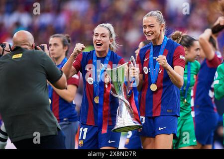 Alexia Putellas and Fridolina Rolfo of FC Barcelona with the cup during the UEFA Women's Champions League 2023/24 Final match between FC Barcelona and Stock Photo