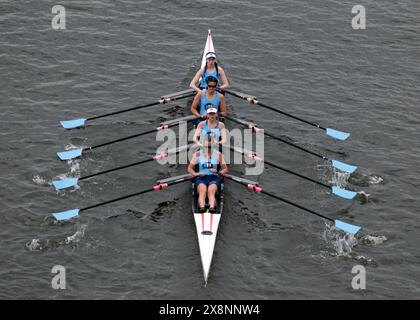 Rowers from Philadelphia City Rowing compete in the annual Stotesbury Cup Regatta, the country's largest high school event, on the Schuylkill River. Stock Photo