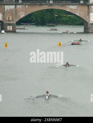 Rowers compete in the annual Stotesbury Cup Regatta, the country's largest high school event, on the Schuylkill River in Philadelphia. Stock Photo