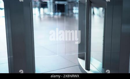 Man passing through the security gates. Media. Man using turnstile to enter the shopping center or subway. Stock Photo