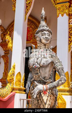 Statue of mustachioed figure outside Wat Chang Kham, Wiang Kum Kam Stock Photo