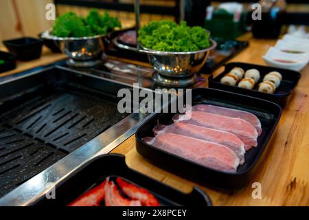 Shabu and Grill is famous Japanese food. Contains seafood, pork, chicken, beef and vegetables. Stock Photo