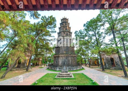 Hue, Vietnam - April 10th, 2024: Thien Mu Pagoda. This is the ancient temples from the 19th century to date and also the spiritual tourist attractions Stock Photo