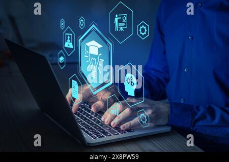 Person using E-learning technology on laptop computer, webinar, online education and training to develop new skill and knowledge. AI-enhanced learning Stock Photo