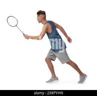 Young man playing badminton with racket on white background Stock Photo