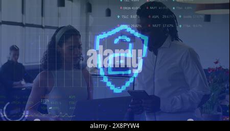 Image of security padlock and data processing over diverse business people in office Stock Photo