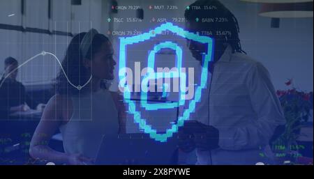 Image of security padlock and data processing over diverse business people in office Stock Photo