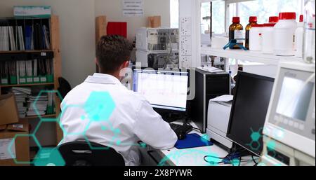 Image of scientific data processing over caucasian male scientist with computer in laboratory Stock Photo