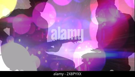 Image of colourful spots moving over silhouette of man and women playing guitar and drums Stock Photo