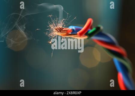 Sparking wiring on blurred background, closeup view Stock Photo