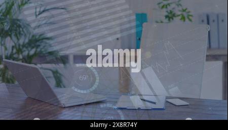 Image of statistical data processing over equipments on office desk against network towers Stock Photo