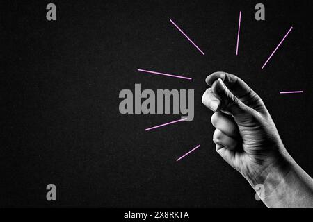 Hand Snapping Fingers for Success, Easy and Click Symbol Gesture Sign in Black and White on Textured Paper Background, Copy Space Stock Photo
