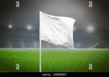 White corner flag in a soccer stadium with blank space, ideal for logo or brand promotion, emphasizing sports marketing Stock Photo