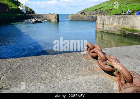 The harbour at Porthgain with heavy chain on quayside, Pembrokeshire, Wales, UK Stock Photo